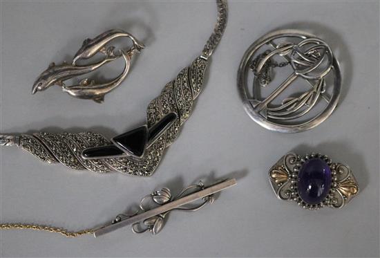 A Georg Jensen silver brooch, no. 278, three other silver brooches including amethyst set and a silver and marcasite necklace.